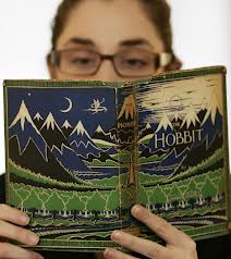 girl reading the hobbit
